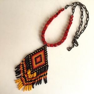 Coral necklace with handmade beaded pendant